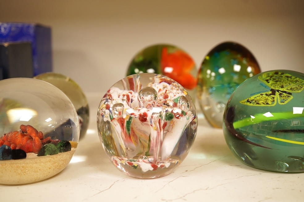 Seventeen various paperweights, including Lalique and a signed Murano example, some boxed, largest 10cm high